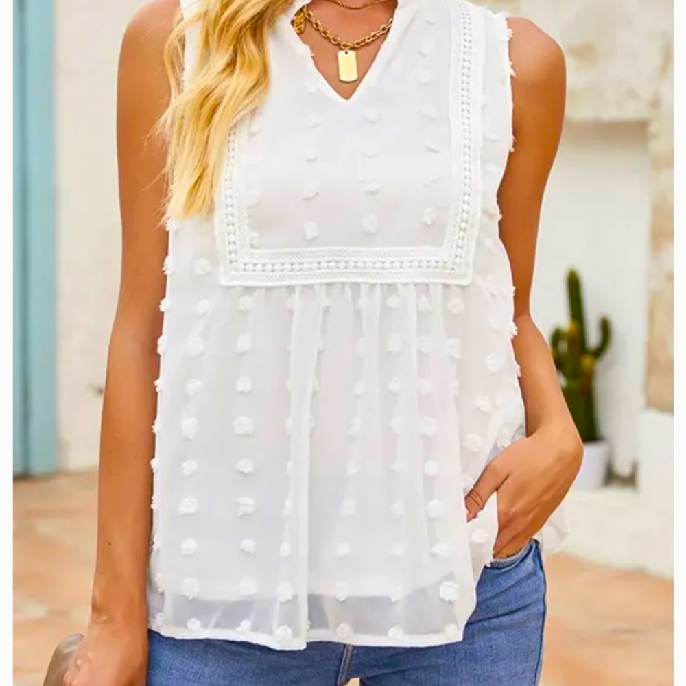 New white sleeveless top